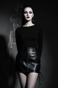 Woman wearing a side lace-up Black Leather Skirt 